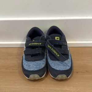 Kids new balance shoes slightly worn, still very good condition.